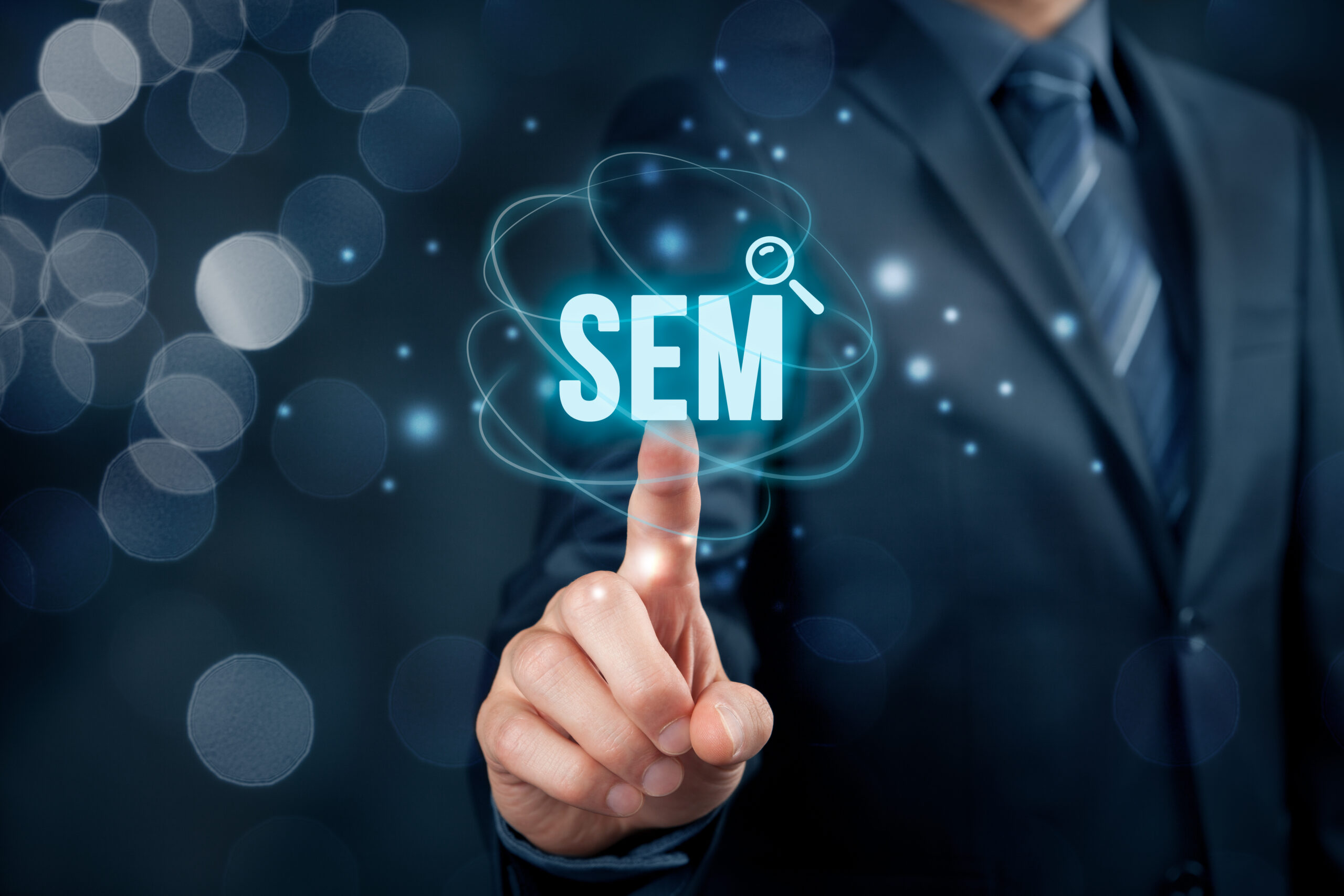 Search engine marketing - SEM concept. Businessman or programmer is focused to improve SEM and web traffic.